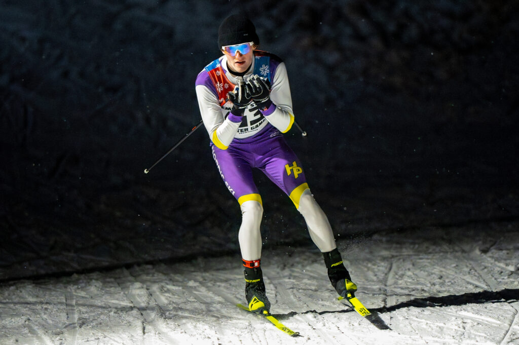 An athlete skiing in the snow