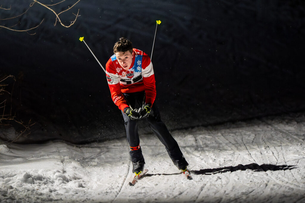 An athlete skiing in the snow