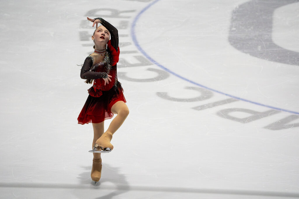 An athlete skating on the rink