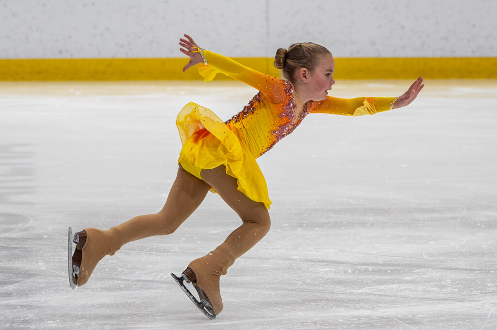 An athlete skating on the rink