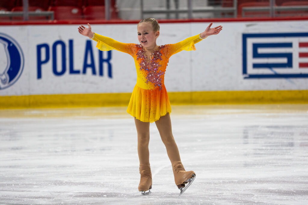 An athlete skating on the rink