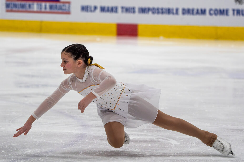 An athlete skating on the rink