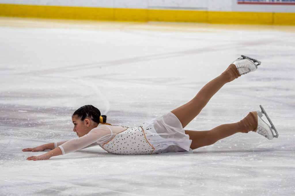 An athlete skating on the rink