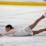 An athlete skating on the rink