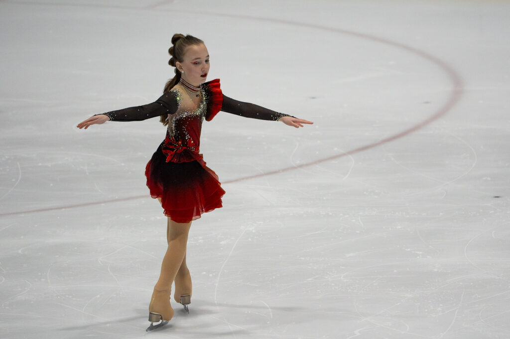 An athlete skating on the rink