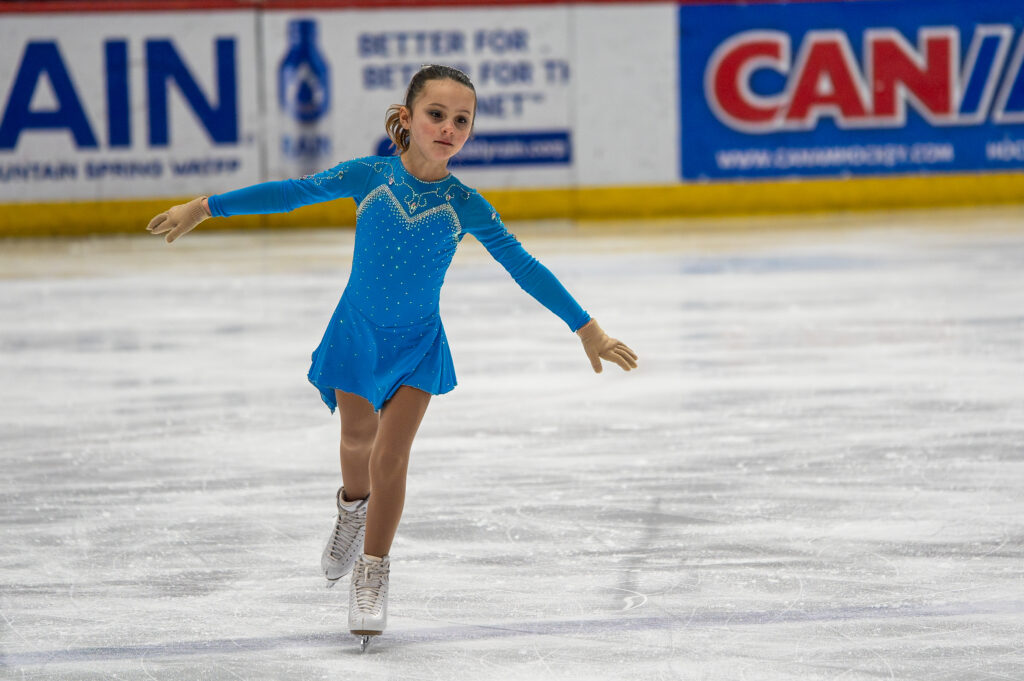 An athlete skating on the rink