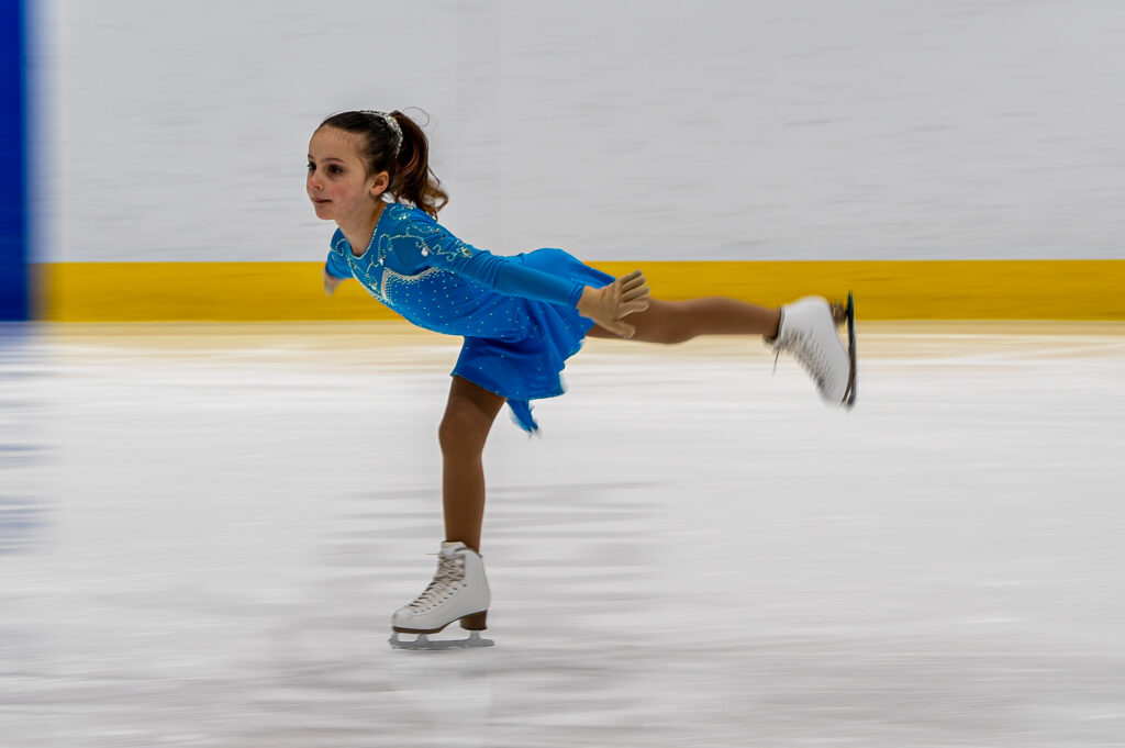 An athlete skating on the rink