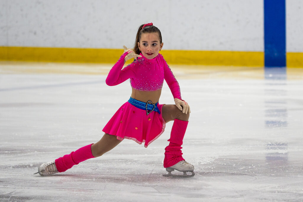 An athlete skating on the rink