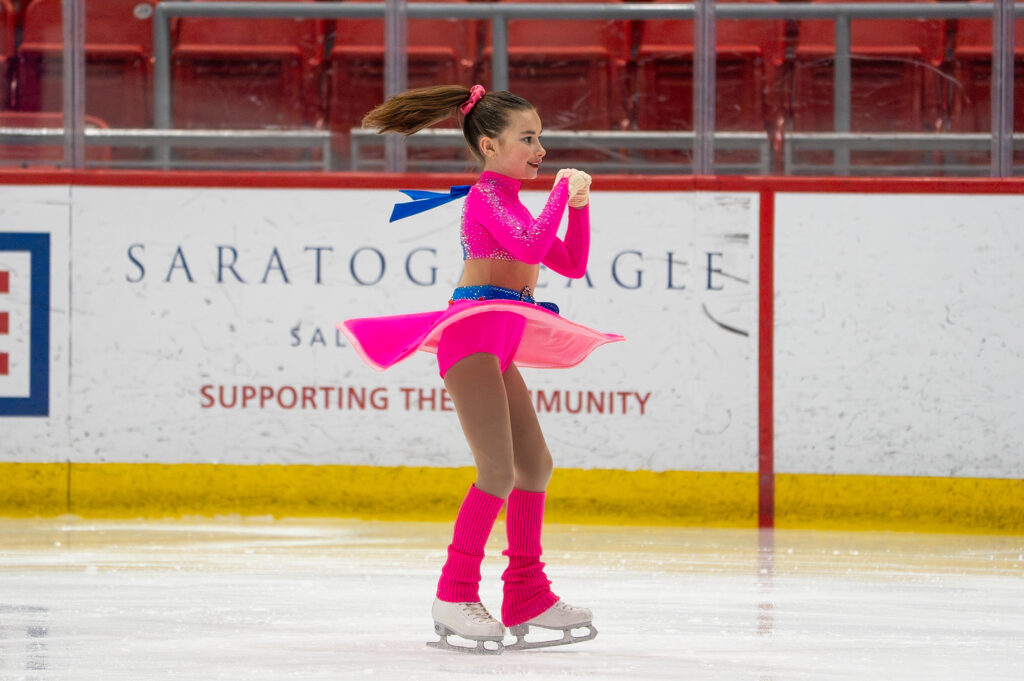 An athlete skating on the rink