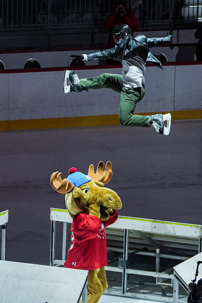 A group of athletes competing in athletic event sports with helmet