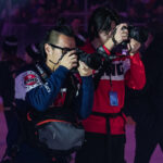 A group of athletes competing in athletic event sports