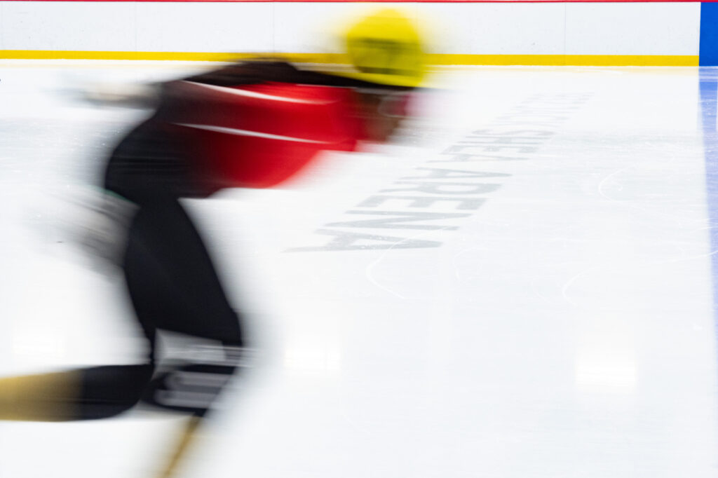 Athletes competing in athletic event sports with helmet