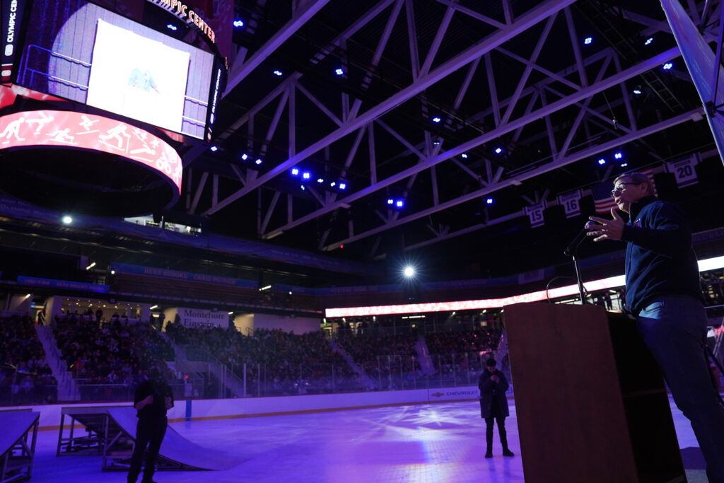 A group of athletes competing in athletic event sports