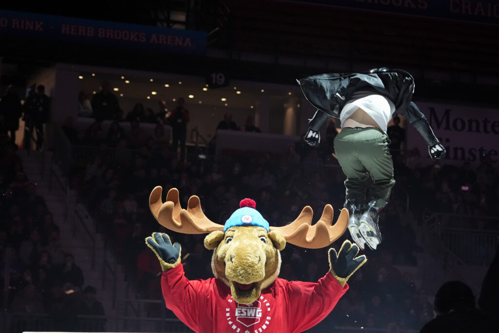 A group of athletes competing in athletic event sports