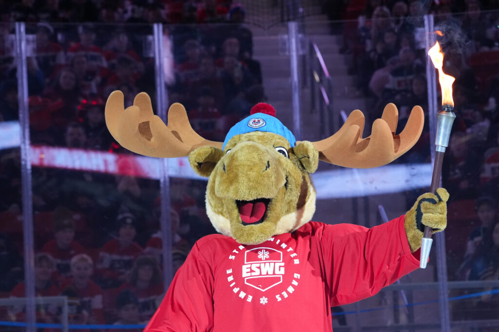 An athlete competing in athletic event sports