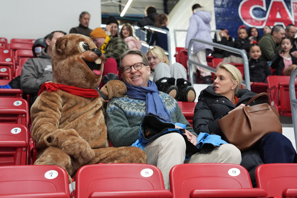A group of athletes competing in athletic event sports with helmet
