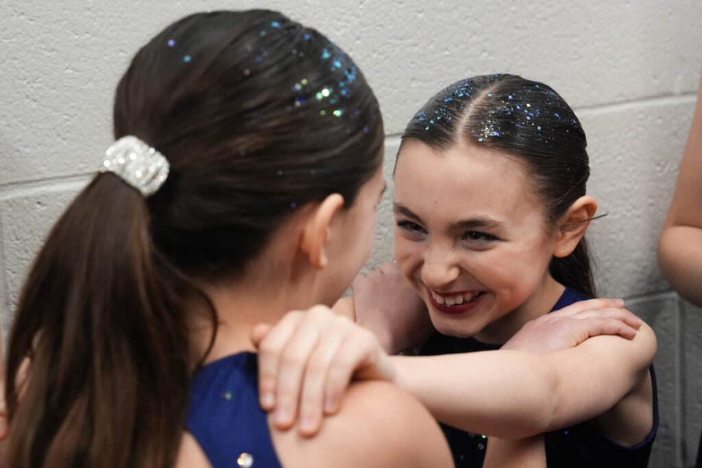 A group of athletes competing in athletic event sports