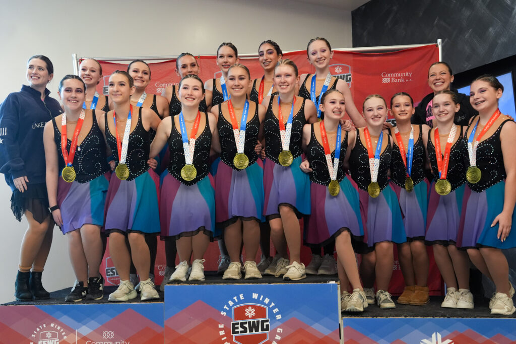 A group of athletes competing in athletic event sports