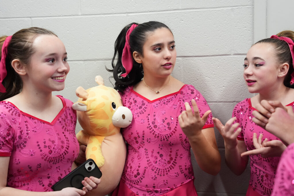 A group of athletes competing in athletic event sports