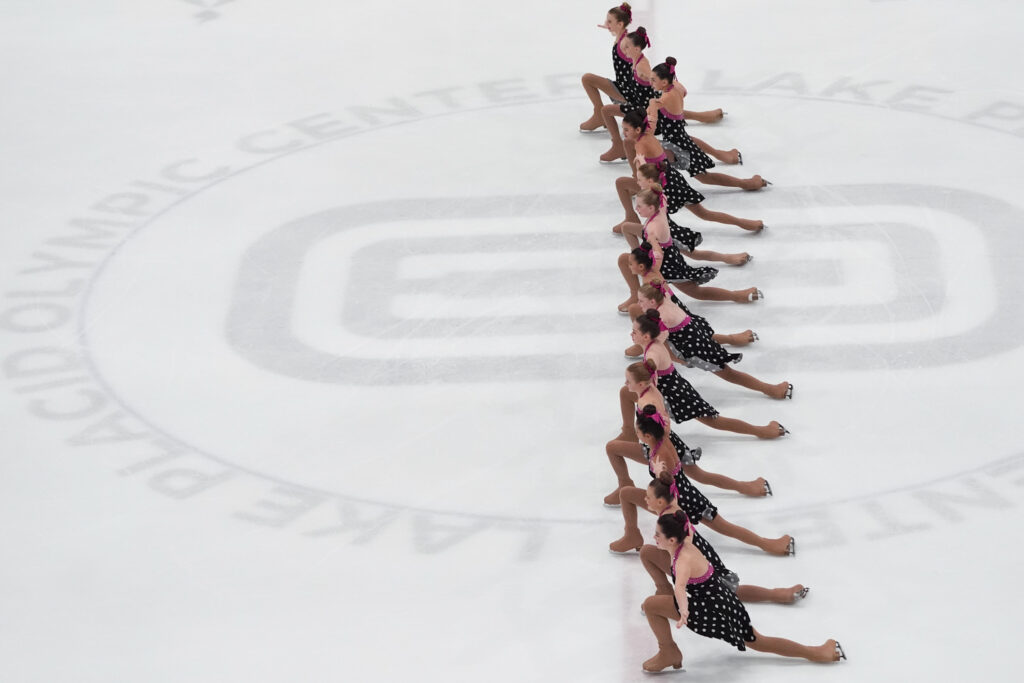 A group of athletes competing in athletic event sports