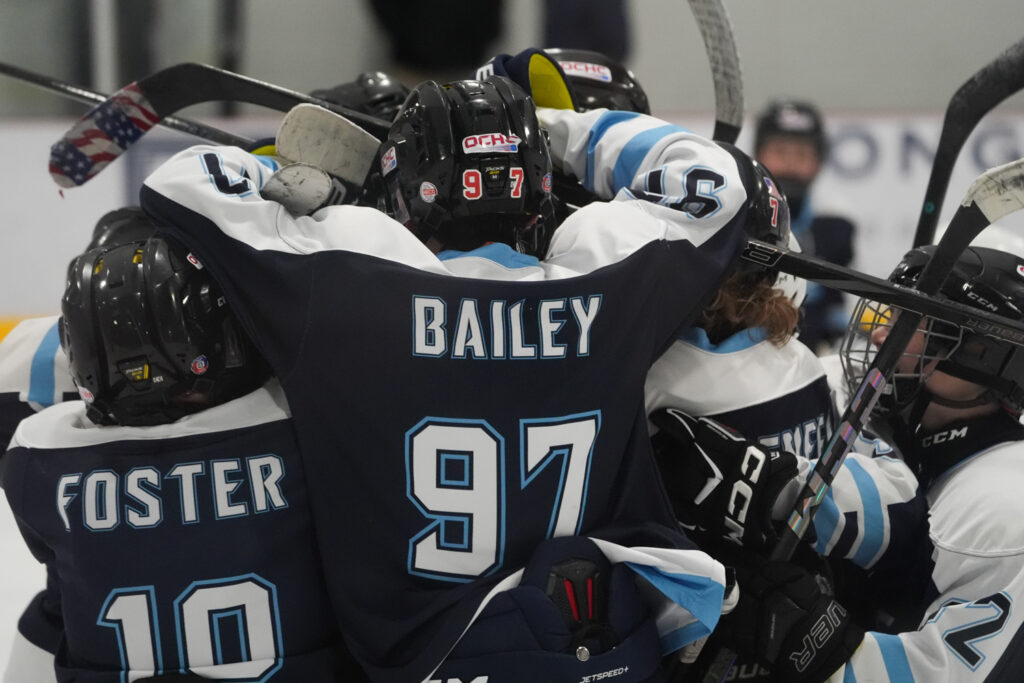 A group of athletes competing in athletic event sports with helmet