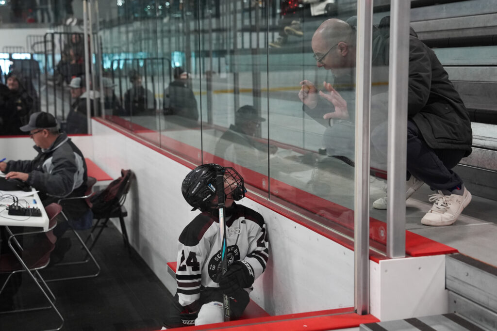 A group of athletes competing in athletic event sports with helmet