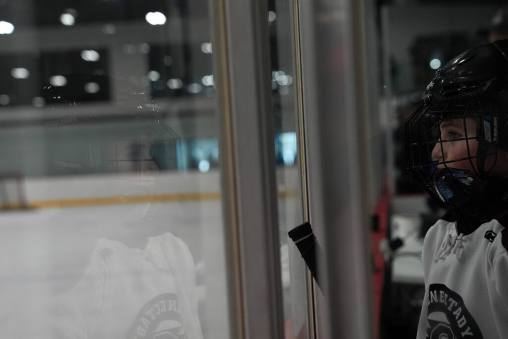 An athlete competing in athletic event sports with helmet