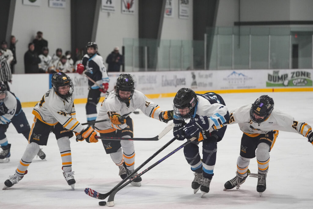 A group of athletes competing in athletic event sports with helmet