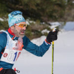 An athlete competing in athletic event sports in the snow