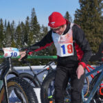 Two athletes competing in athletic event sports