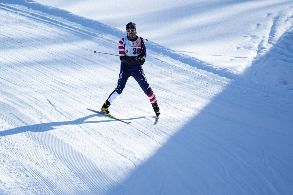 An athlete skiing in the snow