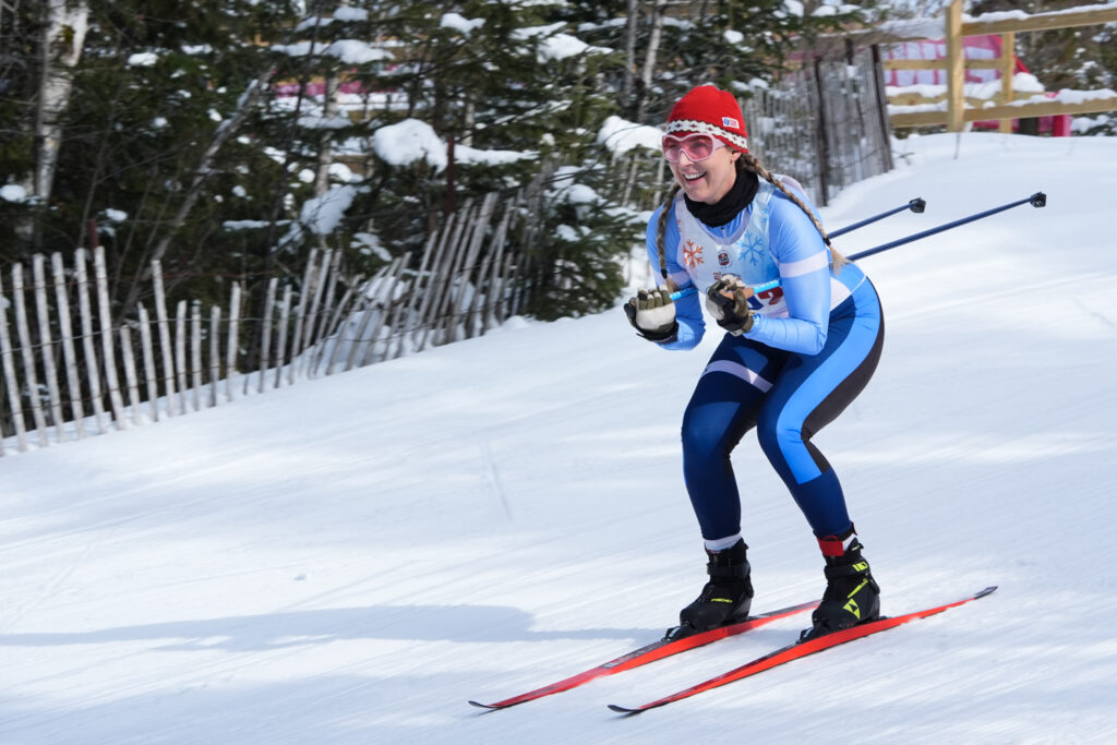 An athlete skiing in the snow