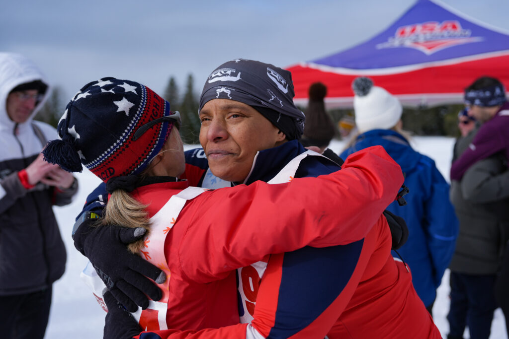 A group of athletes competing in athletic event sports