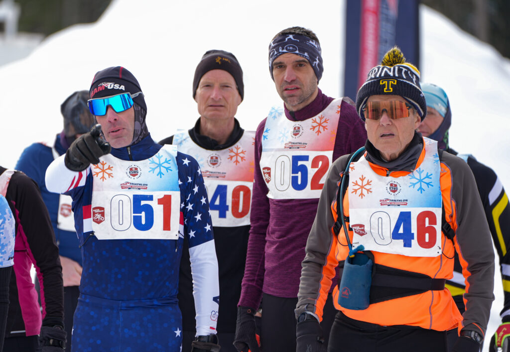 A group of athletes competing in athletic event sports