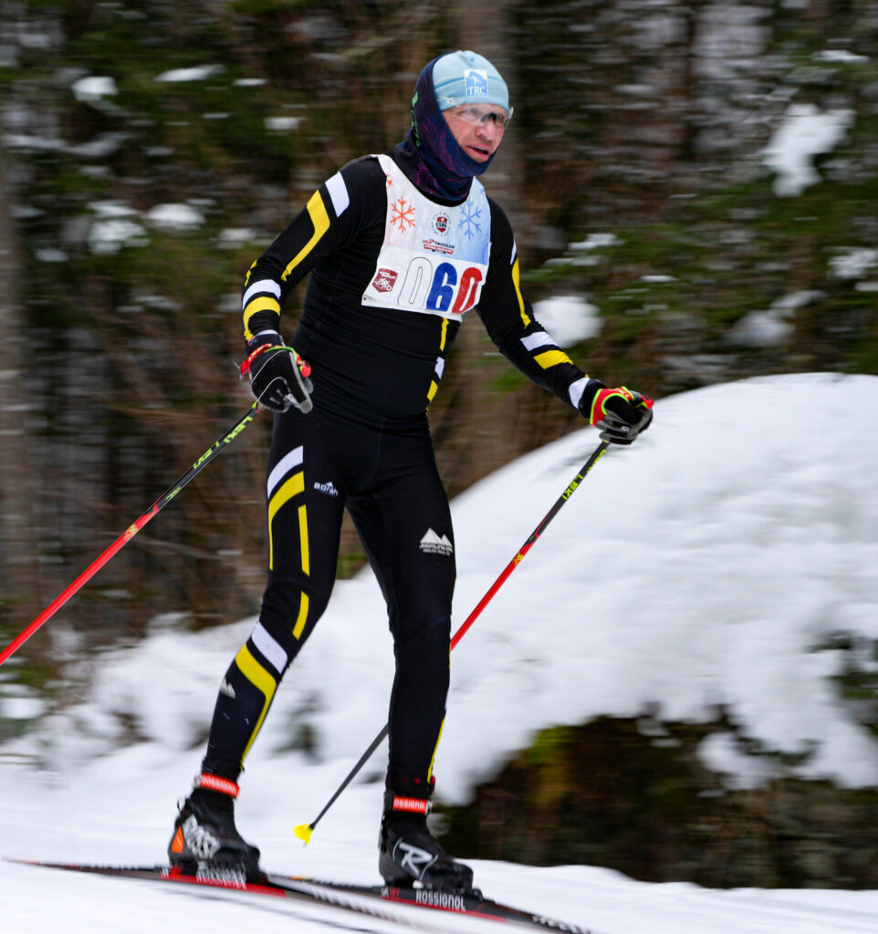 An athlete skiing in the snow