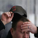 An athlete competing in athletic event sports