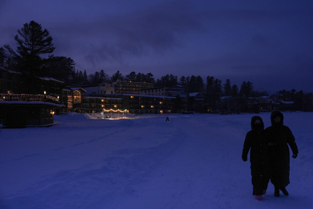 A group of athletes competing in athletic event sports outdoors