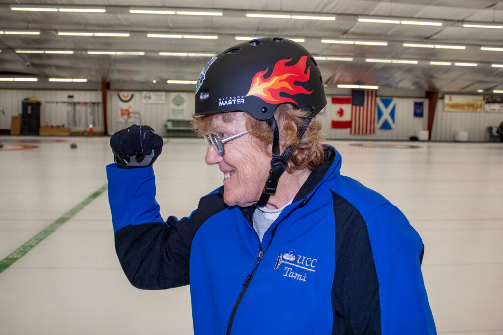 Two athletes competing in athletic event sports with helmet