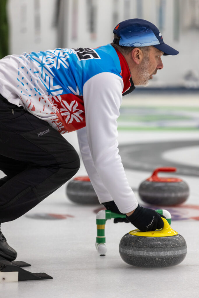An athlete competing curling