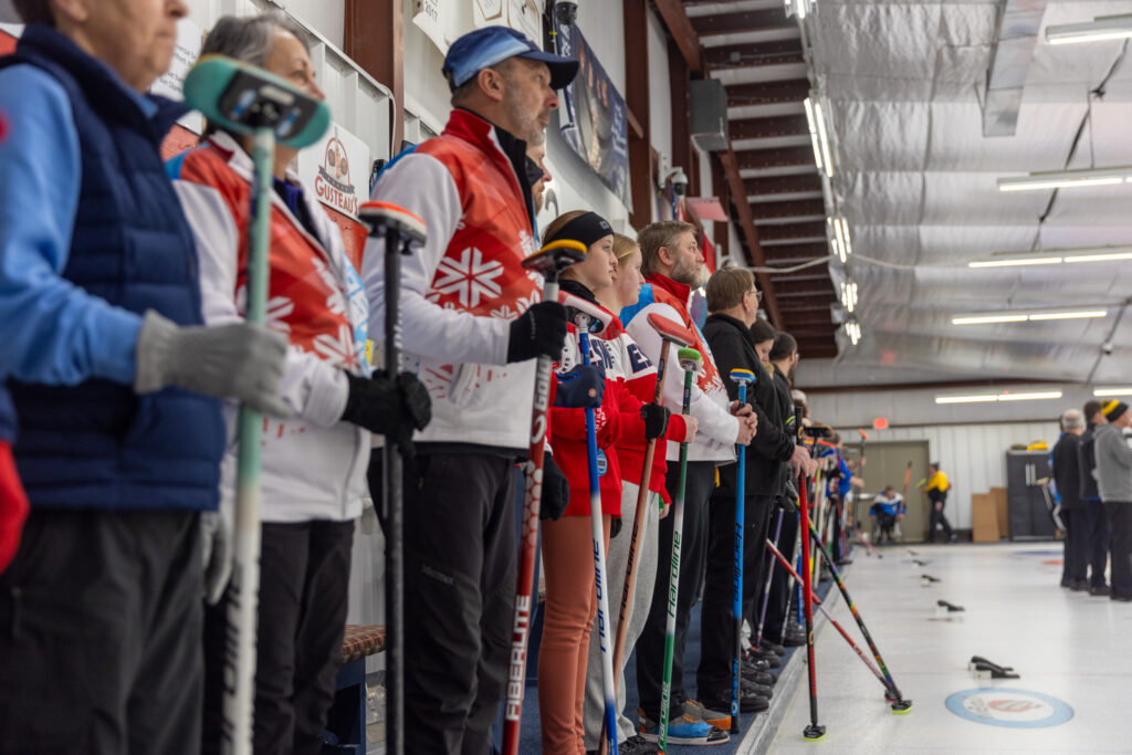 A group of athletes competing in athletic event sports