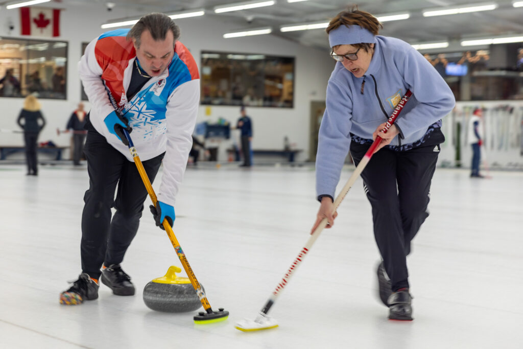 A group of athletes skating on the rink