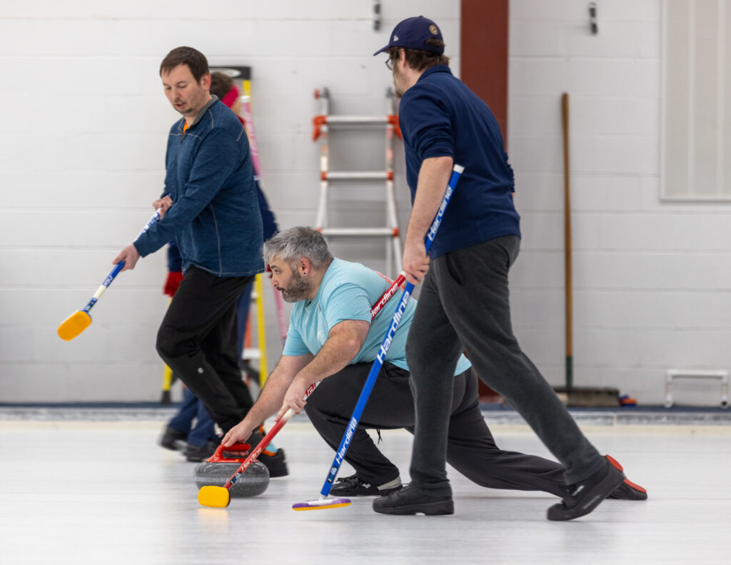 A group of athletes competing in athletic event sports