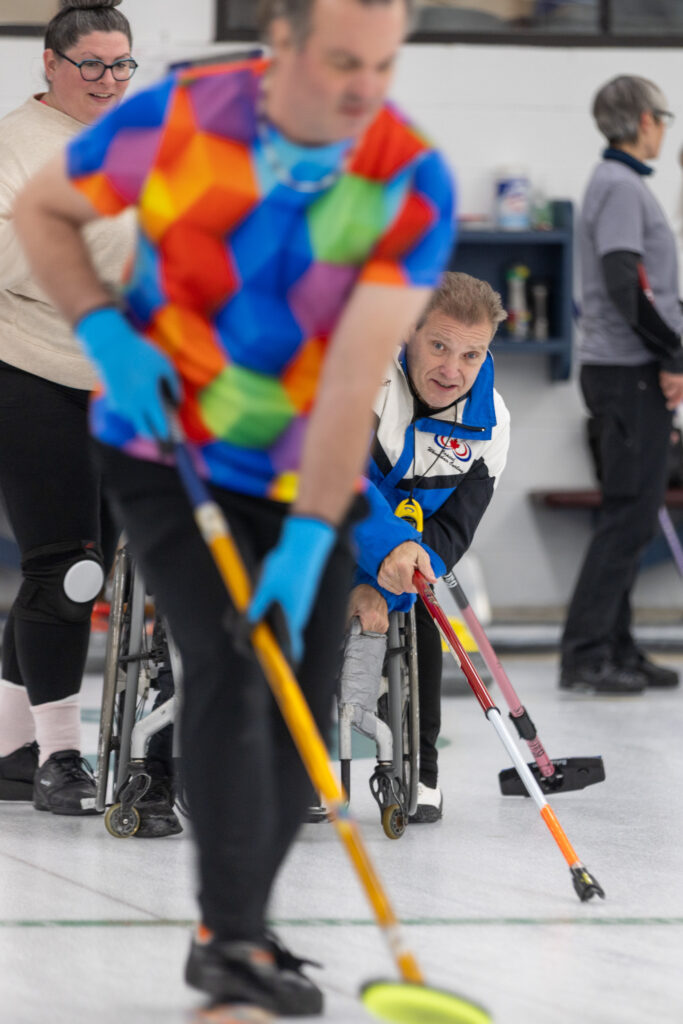 A group of athletes competing in athletic event sports