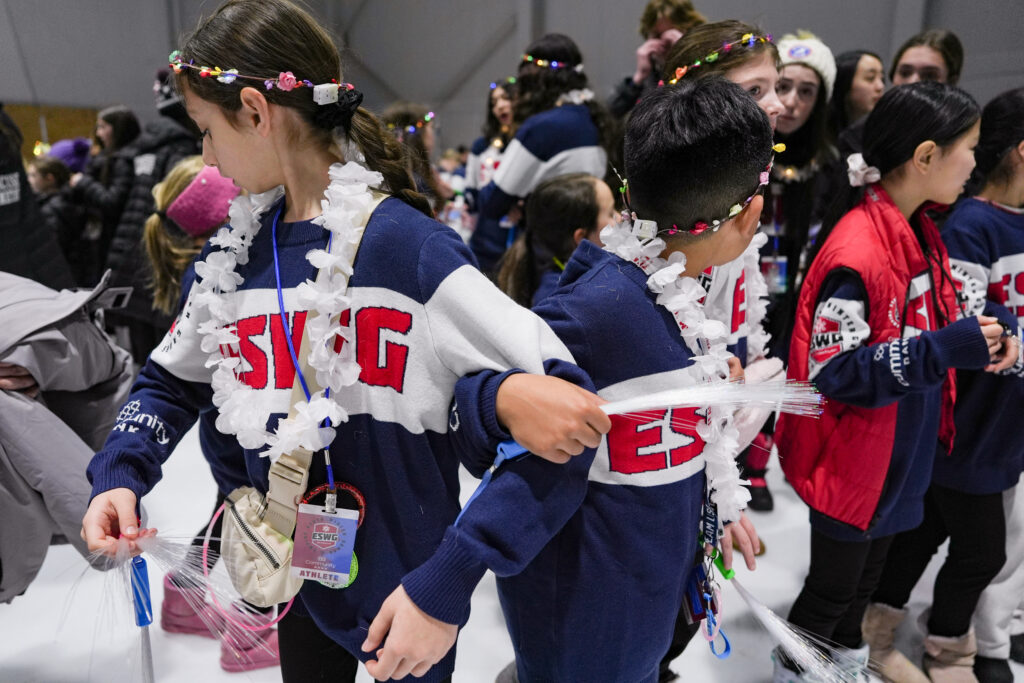 A group of athletes competing in athletic event sports