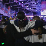 A group of athletes competing in athletic event sports