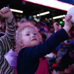 Two athletes competing in athletic event sports