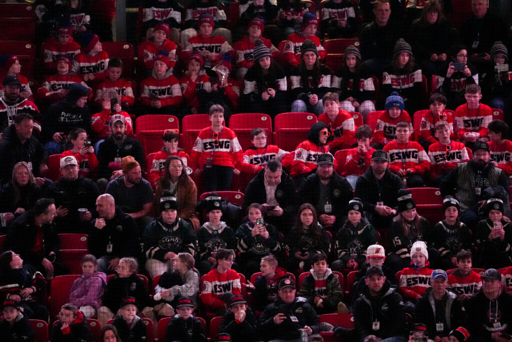 A group of athletes competing in athletic event sports