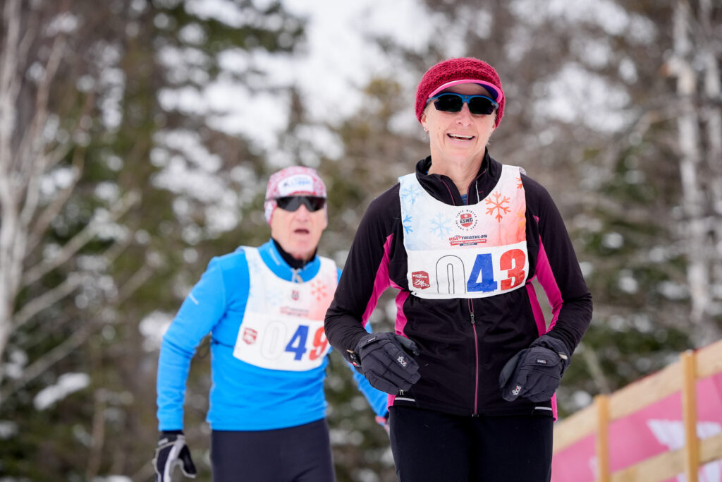 Two athletes competing in athletic event sports