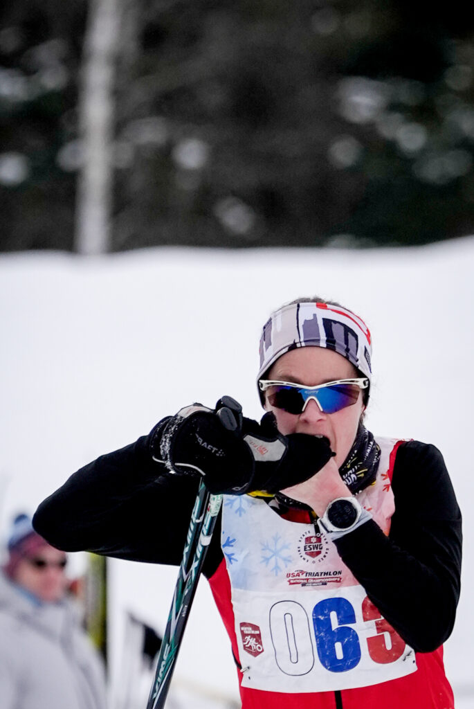 Two athletes competing in athletic event sports in the snow