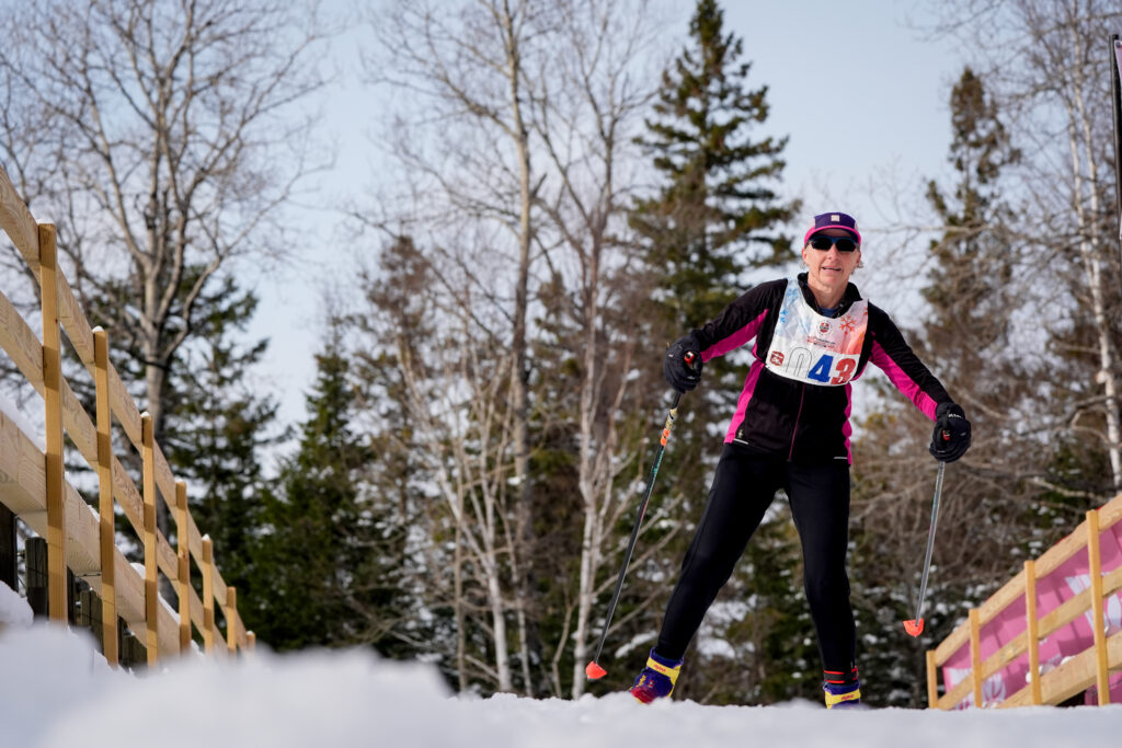 An athlete skiing in the snow